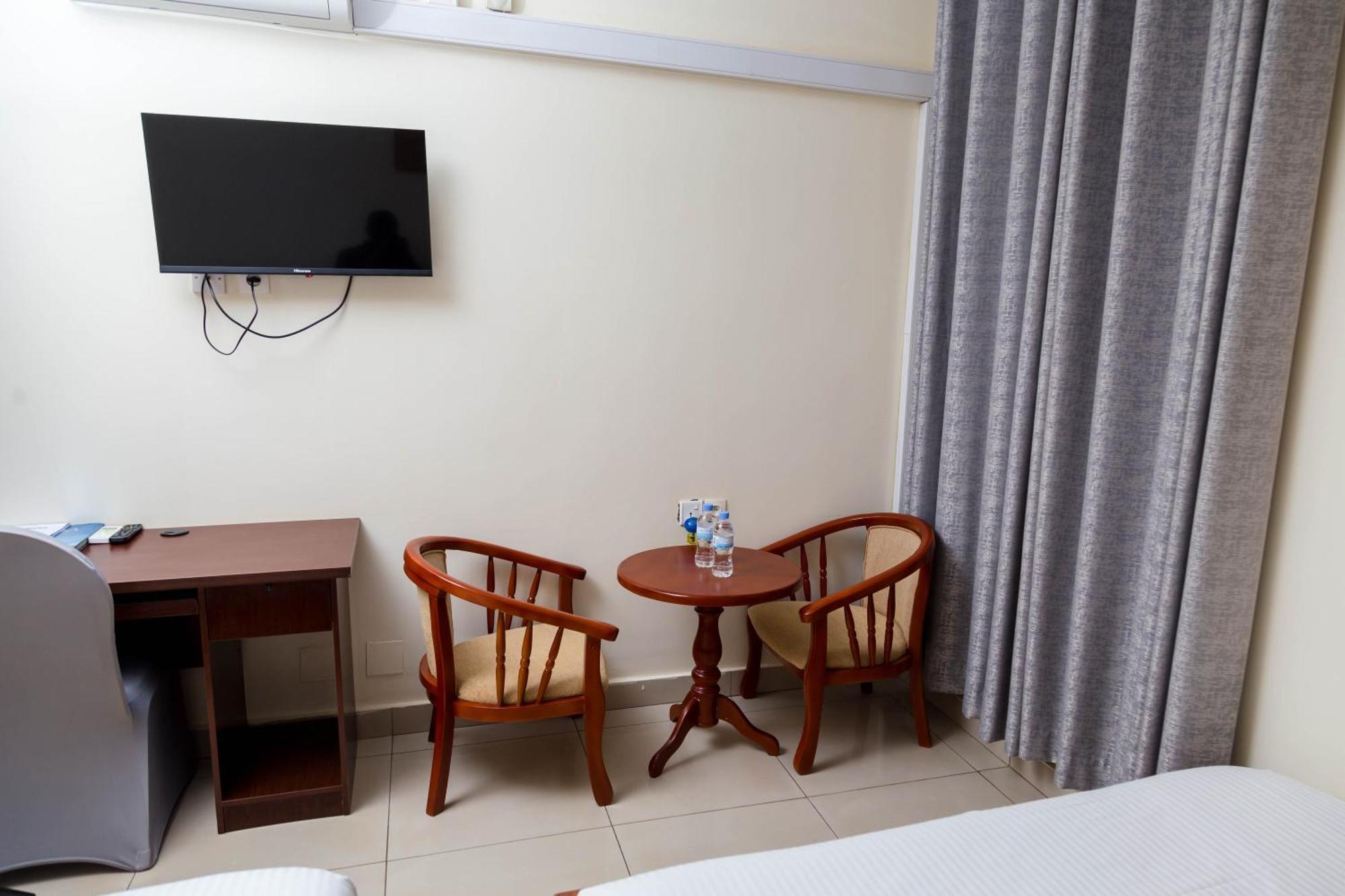 Olympic Hotel Кигали Номер фото