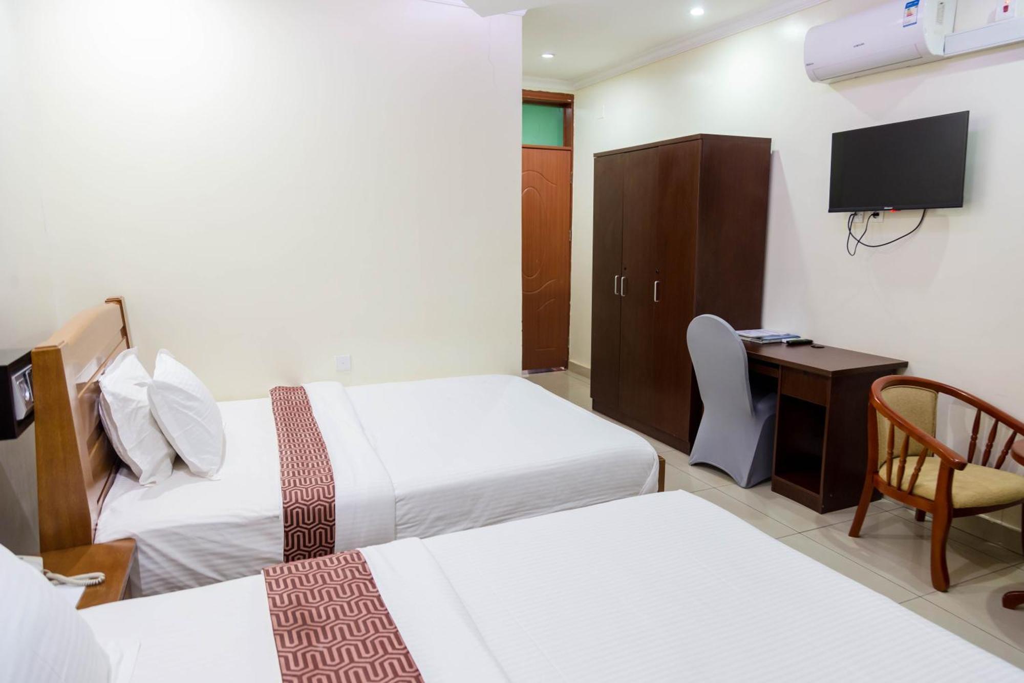 Olympic Hotel Кигали Номер фото